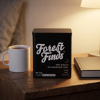 PM Mushroom Tonic tin on a bedside table with a mug