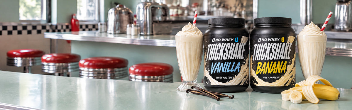 NoWhey Thickshake vanilla and banana on a diner counter